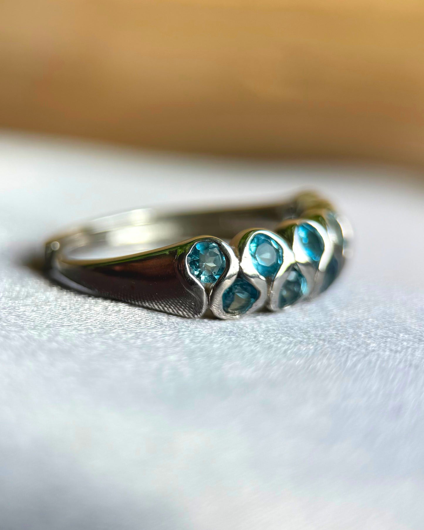 Ocean Wave Natural Blue Topaz Adjustable Ring – Sterling Silver
