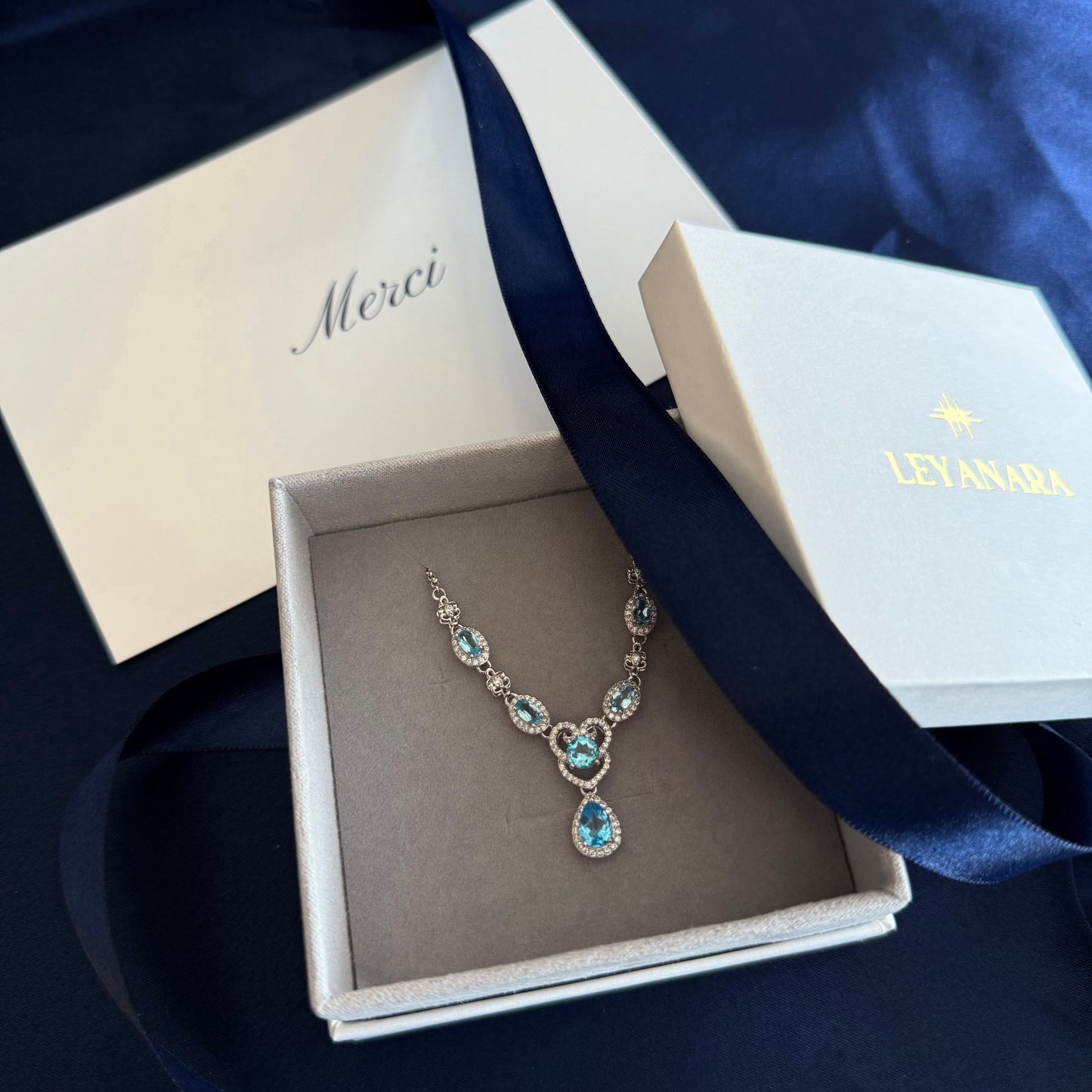 Natural Blue Topaz Teardrop Necklace in Sterling Silver