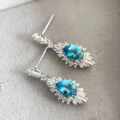 Luminous Natural Blue Topaz Halo Drops – Sterling Silver