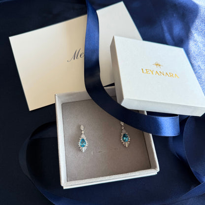 Luminous Natural Blue Topaz Halo Drops – Sterling Silver